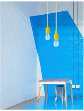 Pendul galben din silicon cu fir din material textil Swing